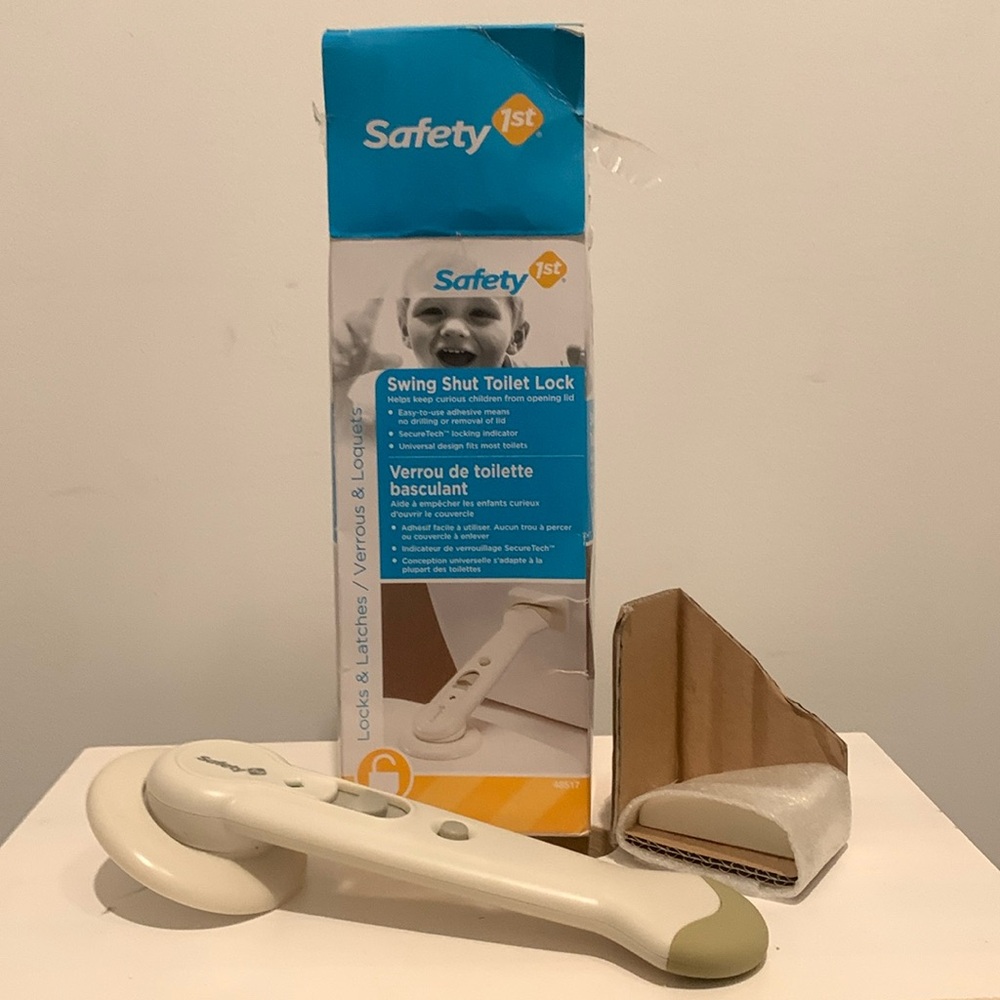 Safety 1st toilet lock. Brand new in box. Only opened for the picture.
